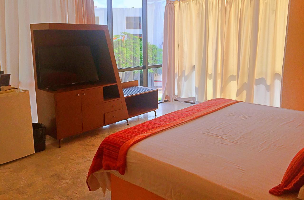 Hotel Versalles Suites Cancún Extérieur photo