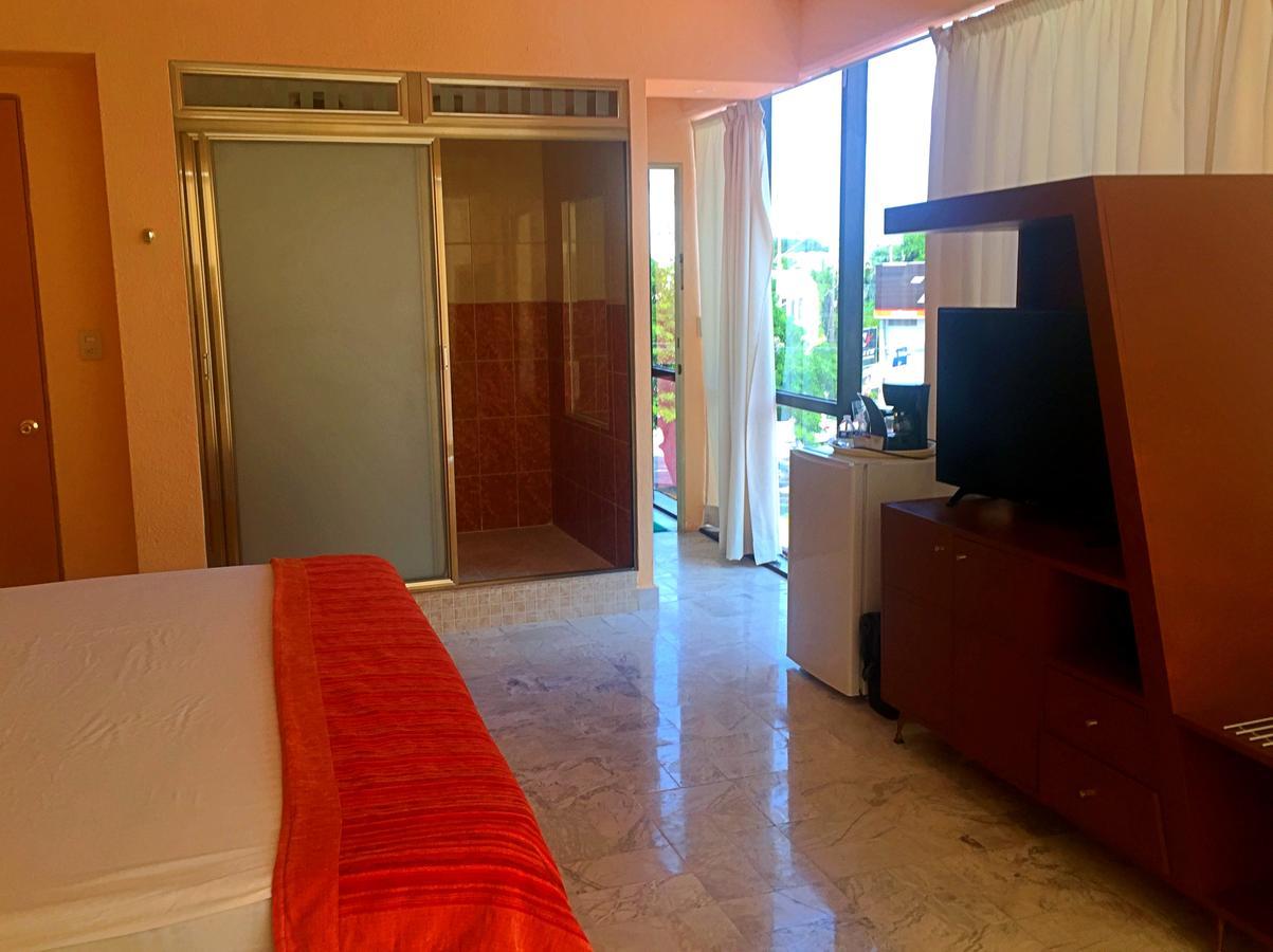 Hotel Versalles Suites Cancún Extérieur photo