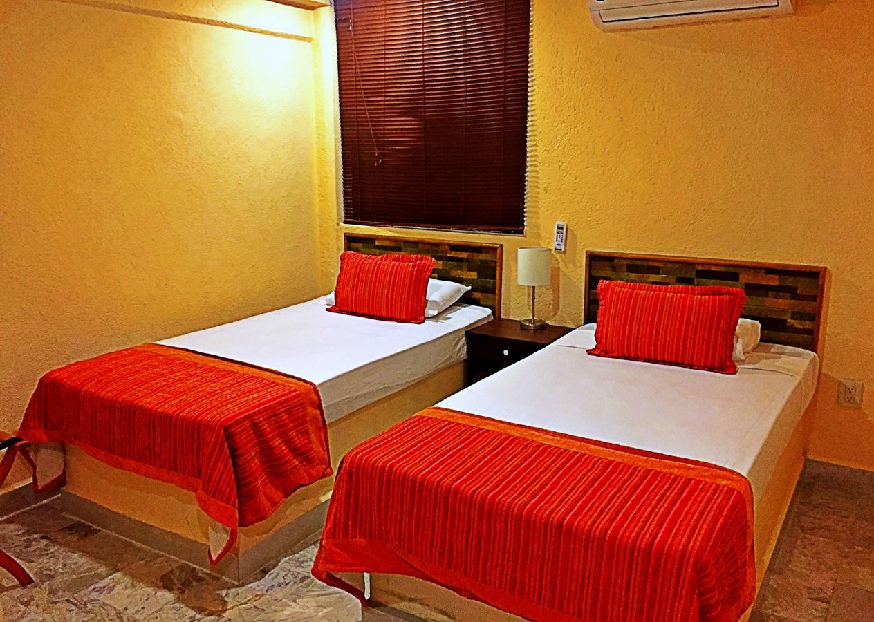 Hotel Versalles Suites Cancún Extérieur photo