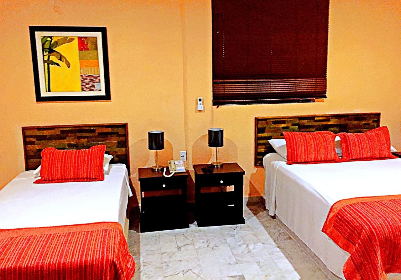 Hotel Versalles Suites Cancún Extérieur photo