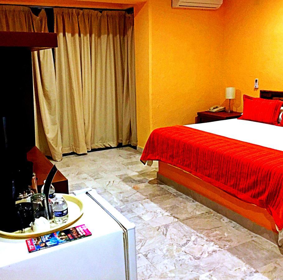 Hotel Versalles Suites Cancún Extérieur photo
