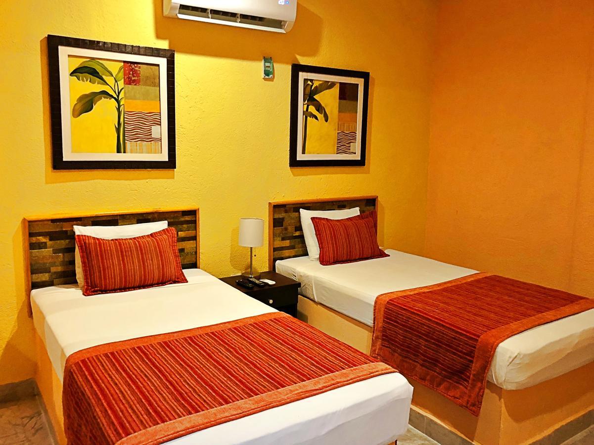 Hotel Versalles Suites Cancún Extérieur photo