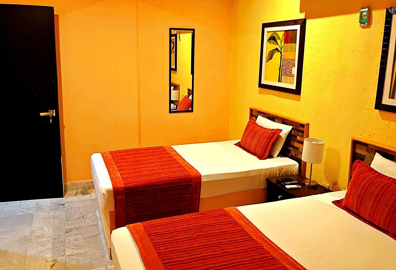 Hotel Versalles Suites Cancún Extérieur photo