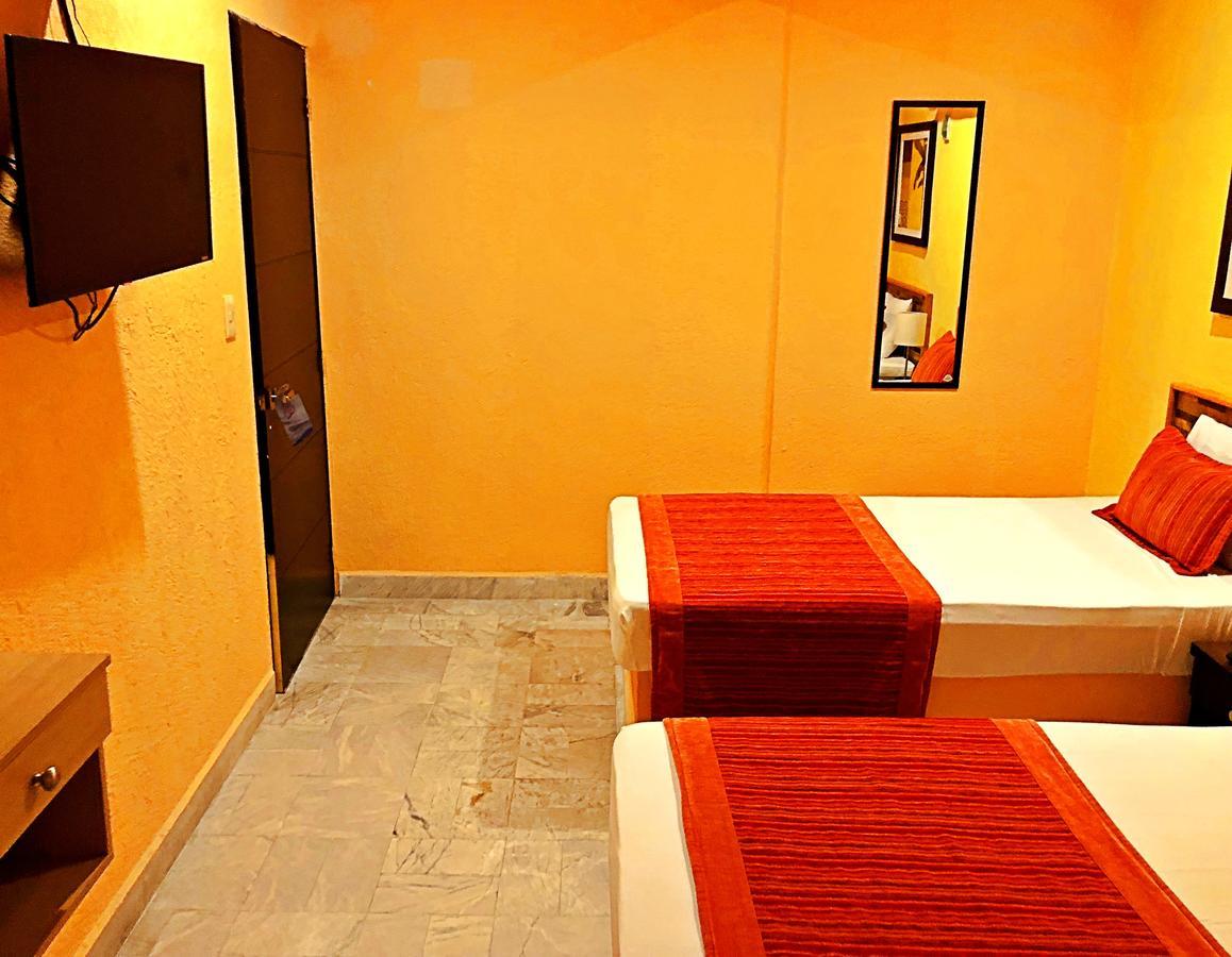 Hotel Versalles Suites Cancún Extérieur photo